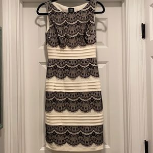 Size 4. Jax. White dress with black lace. Lined. Very flattering. Worn once.